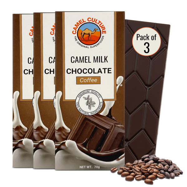 Camel milk chocolate bar with packaging and coffee beans on a white background
