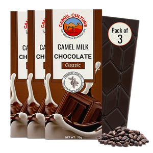 Camel milk chocolate packaging with a pack of three and cocoa beans on a white background
