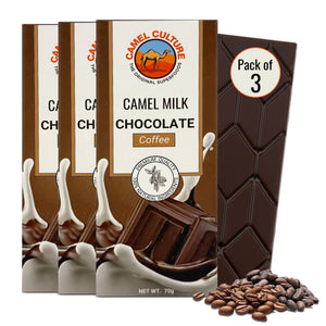 Camel milk chocolate bar with packaging and coffee beans on a white background