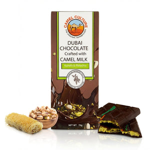 Dubai chocolate bar with camel milk, packaging, and ingredients on a white background