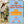 Woman walking a dog with Camel Culture product label in the background