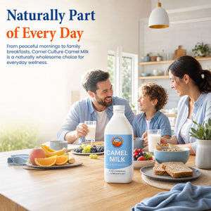 A family sits at a wooden dining table in a bright kitchen, drinking from glasses and eating breakfast. A large bottle of Camel Milk is prominently displayed in the foreground on the table, with promotional text on the left side of the image.