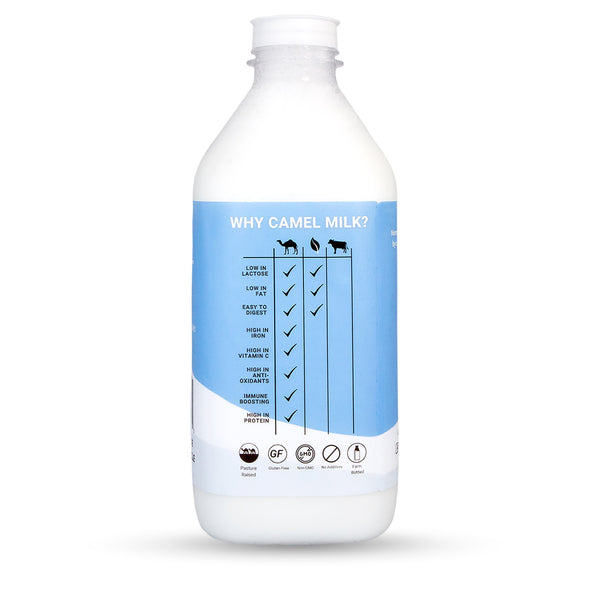 A camel milk liter bottle (33 oz.) displaying the health benefits of camel milk on the label.